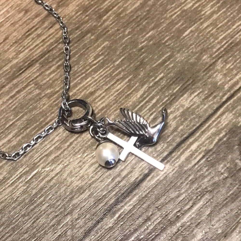 Dove, pearl, and cross necklace